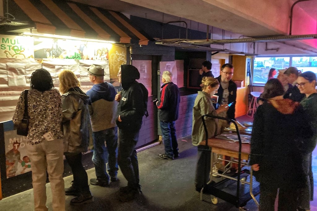People gathered at the Peckham Levels